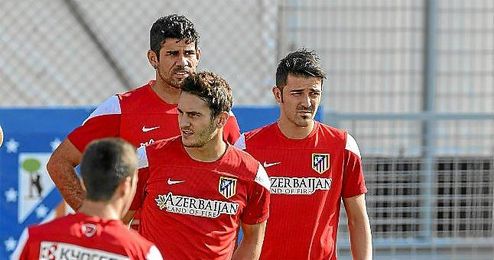 Koke en el entrenamiento del Atlético junto a Villa y Diego Costa. Koke en el entrenamiento del Atlético junto a Villa y Diego Costa.