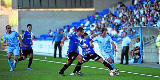 Lance del partido entre el Lucena y el Écija. Lance del partido entre el Lucena y el Écija.
