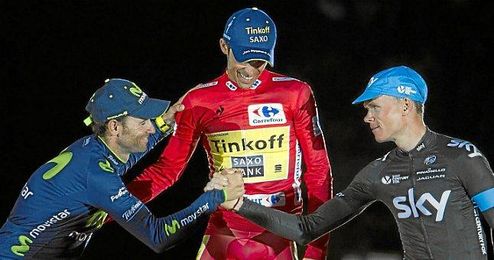 Valverde, Contador y Froome se saludan en el podio de la pasada edición. Valverde, Contador y Froome se saludan en el podio de la pasada edición.