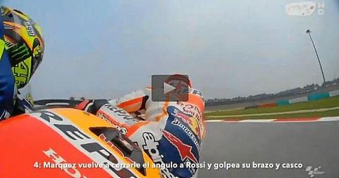 Marc Márquez en la pugna con Valentino Rossi. Marc Márquez en la pugna con Valentino Rossi.