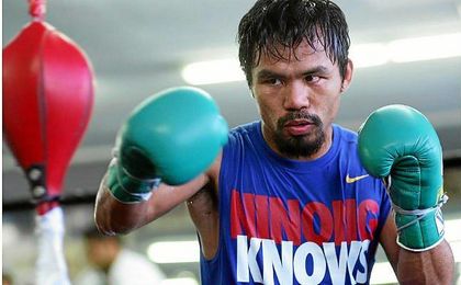 Manny Pacquiao habrá de combinar sus funciones políticas con el boxeo. Manny Pacquiao habrá de combinar sus funciones políticas con el boxeo.