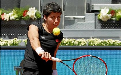 Carla Suárez golpea una bola durante el Madrid Open. Carla Suárez golpea una bola durante el Madrid Open.