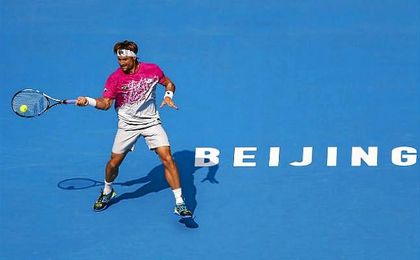 Los españoles David Ferrer y Garbiñe Muguruza pasan de ronda en el Open de China. Los españoles David Ferrer y Garbiñe Muguruza pasan de ronda en el Open de China.