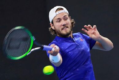 Nadal salva dos bolas de partido ante Pouille y supera la primera ronda Nadal salva dos bolas de partido ante Pouille y supera la primera ronda