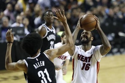 129-102. Johnson dirige la victoria de los Heat 129-102. Johnson dirige la victoria de los Heat