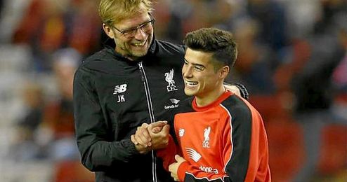 Joao Carlos, junto a Klopp, en un partido del Liverpool ante el Bournemouth. Joao Carlos, junto a Klopp, en un partido del Liverpool ante el Bournemouth.