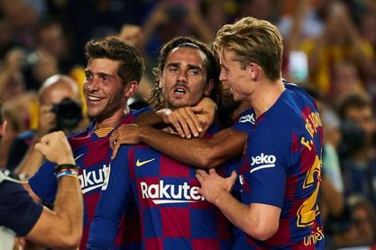 Griezmann rescata al Barça, Vitolo al Atlético y el Sevilla líder Griezmann rescata al Barça, Vitolo al Atlético y el Sevilla líder